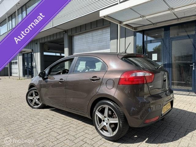 Kia Rio 1.4 CVVT Super Pack Bomvol Pano Automaat Leer stuur, Auto's, Euro 5, 450 kg, Gebruikt, 4 cilinders
