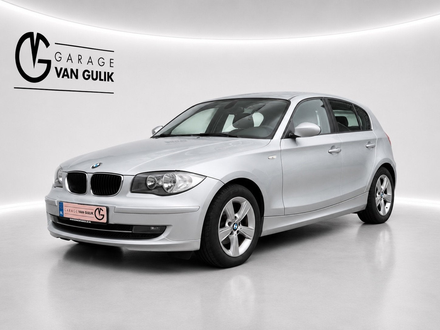 BMW 1-serie 116i 122PK ClimateCtrl,Stoelverw.,Lmv,Pdc,Keyles, Auto's, 1-Serie, Euro 5, Zwart, 4 cilinders