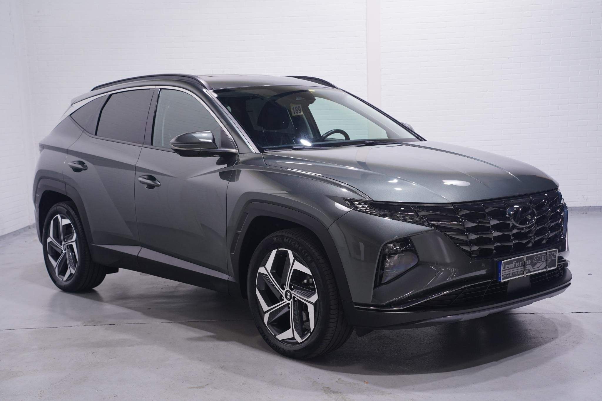 Hyundai Tucson 1.6 T-GDI HEV Premium 1e eign. NAP Navigatie, Auto's, Automatische klimaatregeling, Gebruikt, Euro 6, 4 cilinders
