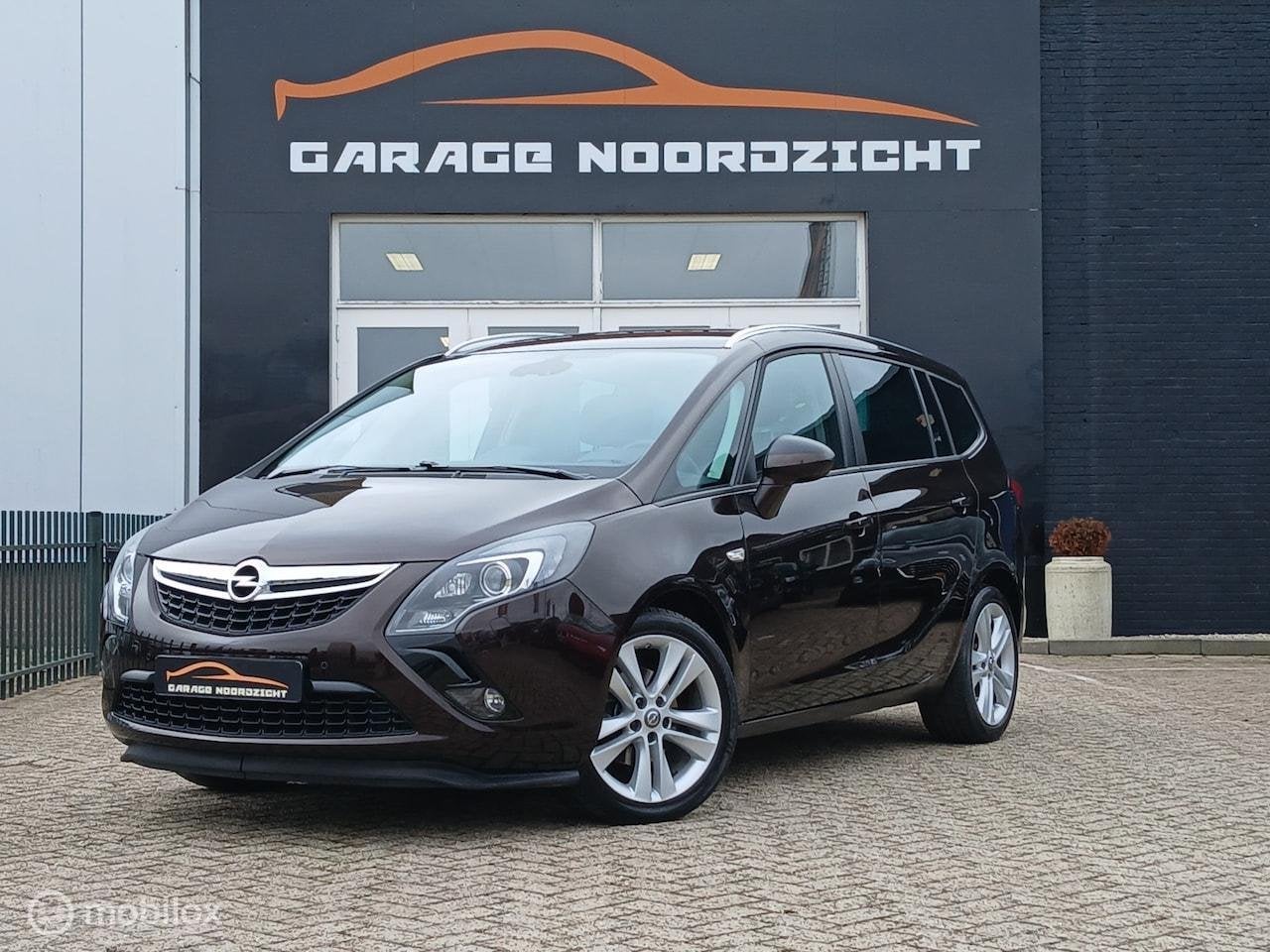 Opel Zafira Tourer 1.4 Cosmo 7-persoons Turbo 140pk, Auto's, Stof, Gebruikt, 4 cilinders, Bruin