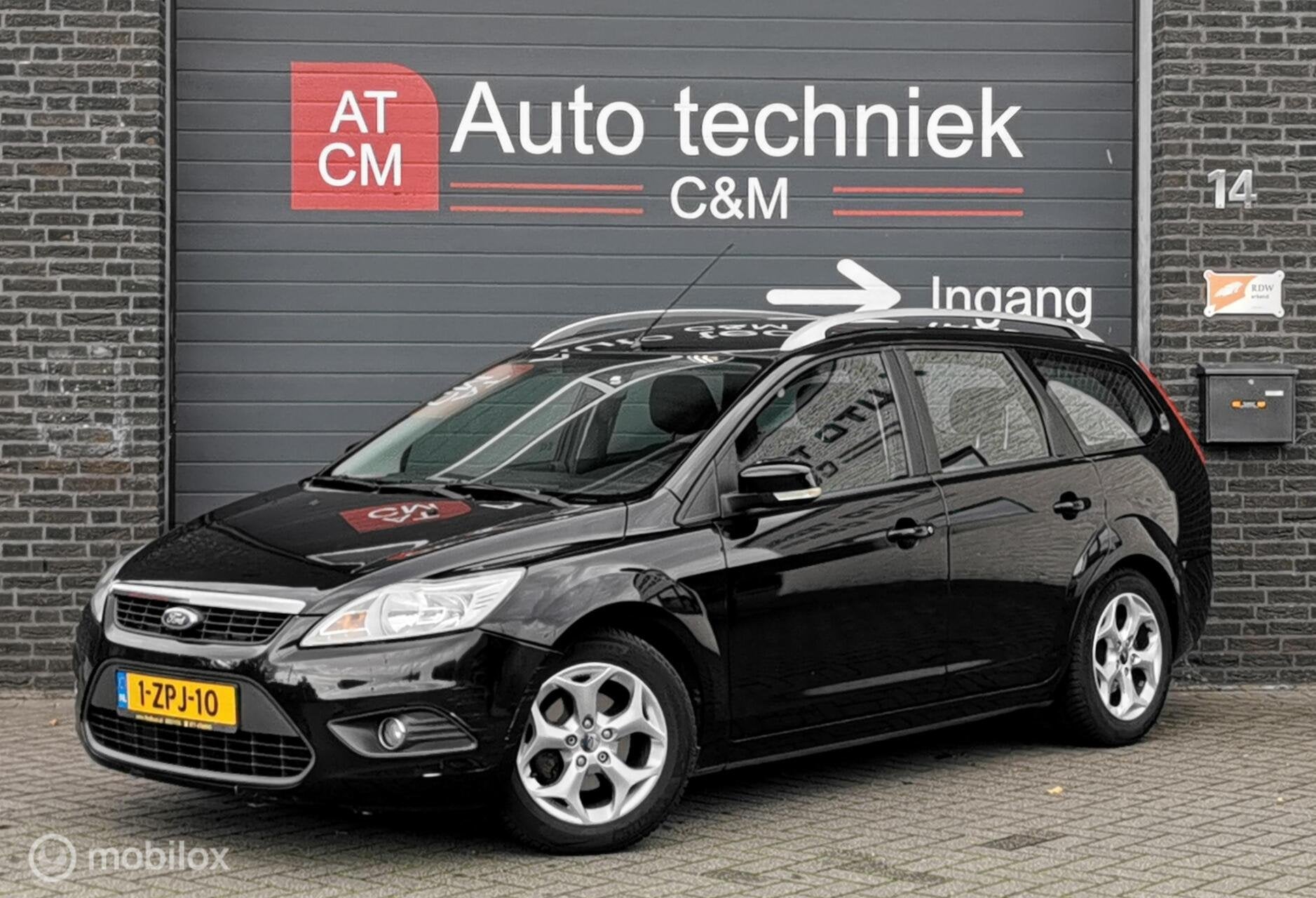 Ford Focus Wagon 1.6 Ghia 101PK/AIRCO/ELEKTR/CV/CRUISE/MTF/, Auto's, 1596 cc, Zwart, 635 kg, Zwart