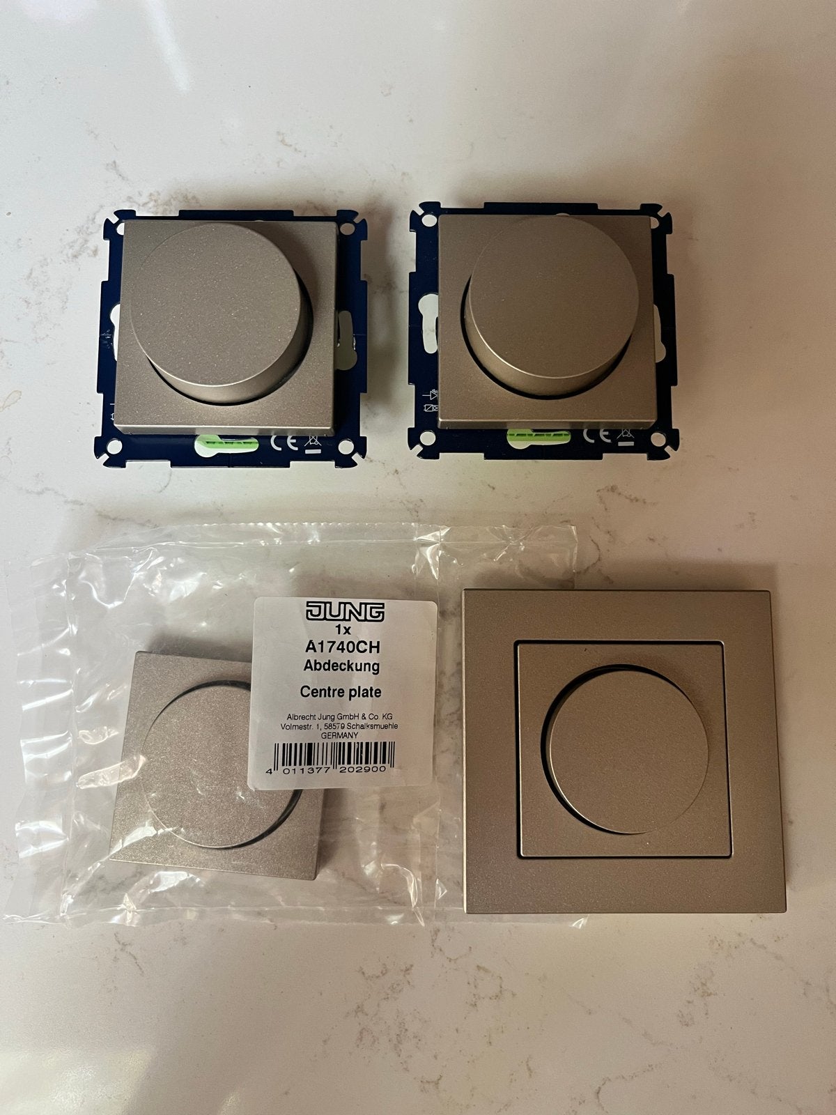 Nieuwe Jung dimmer knoppen champagne (4 stuks) + afdekplaat, Ophalen of Verzenden, Nieuw, Schakelaar