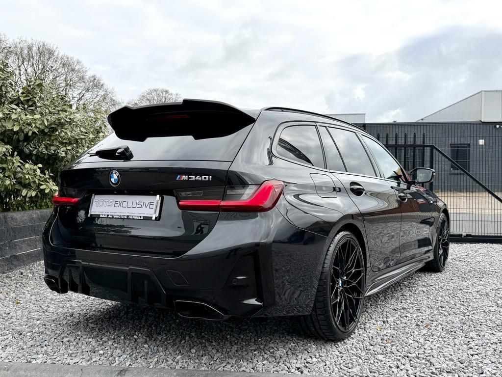 BMW 3 Serie Touring M340i xDrive Pano|Leer|LED|Camera|Headup, Auto's, Automaat, Gebruikt, 1770 kg, Met garantie (alle)