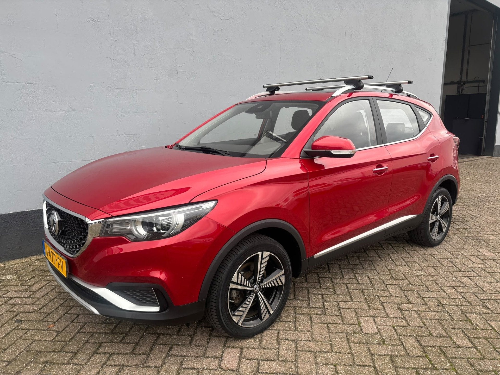 MG MG ZS EV Luxury 45 kWh - Panorama - Leder - Dak Dragers, Auto's, Gebruikt, Huisgarantie, Met garantie (alle), ZS