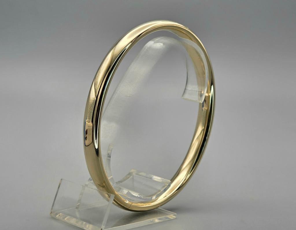 Gouden vintage classic bangle/slavenarmband. 2025/624., Sieraden, Tassen en Uiterlijk, Antieke sieraden, Armband, Goud, Ophalen of Verzenden