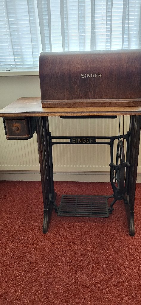 oude trapnaaimachine singer, Ophalen