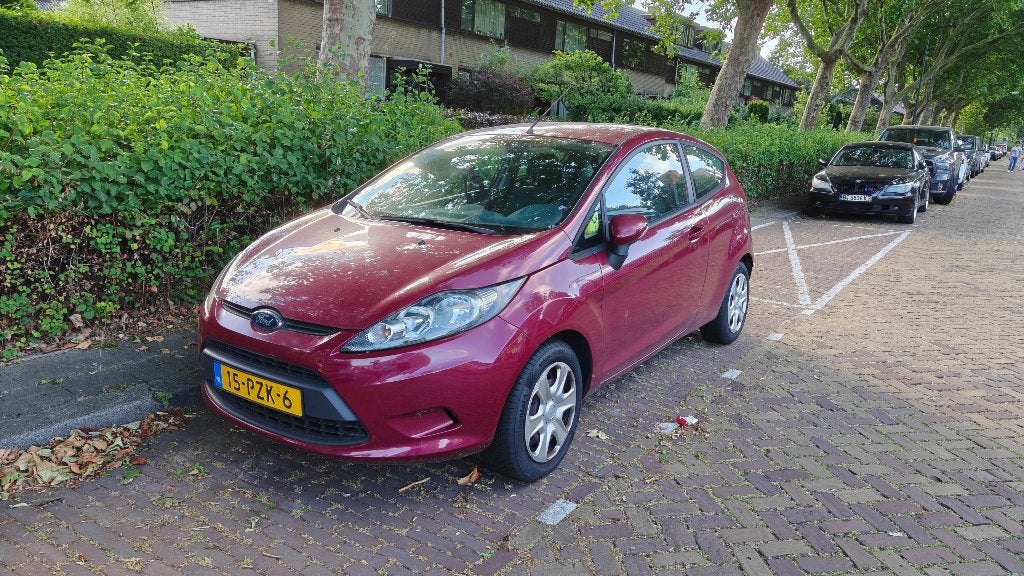 Ford Fiësta 1.25 44KW 3DR 2011 Rood nieuwe 4 season banden!, Auto's, Voorwielaandrijving, Stof, 4 cilinders, Origineel Nederlands