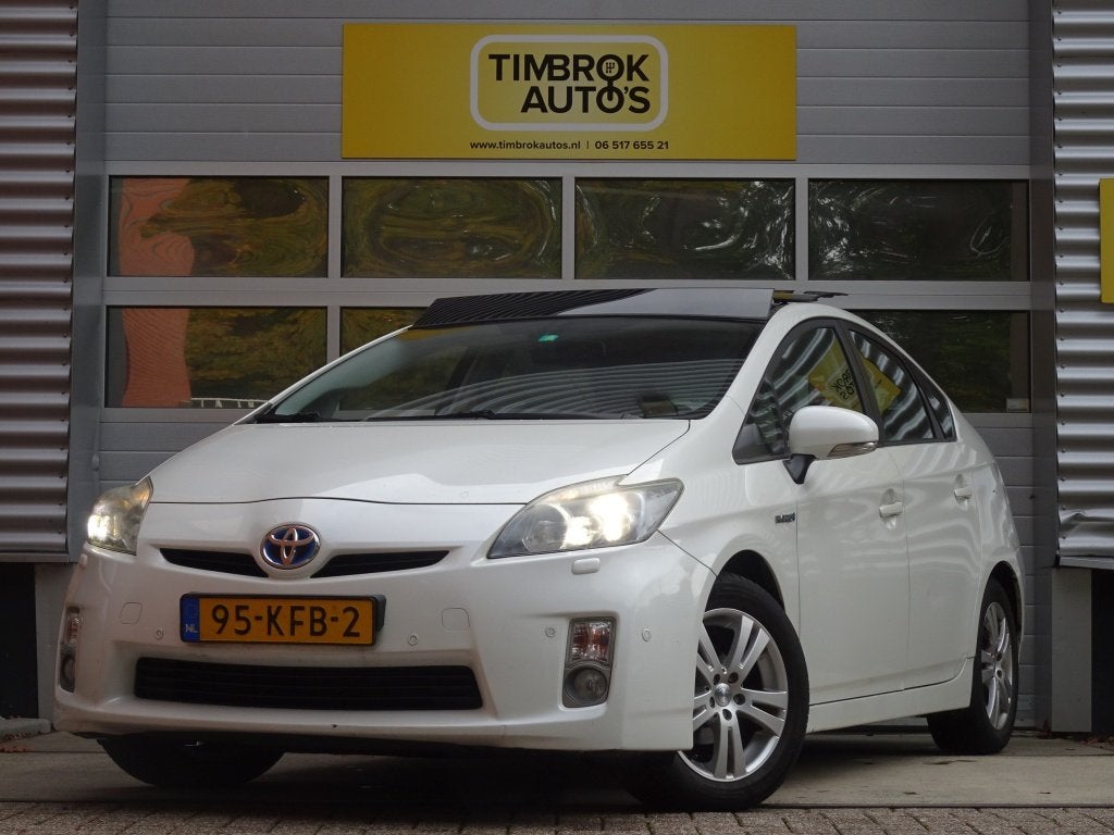 Toyota Prius 1.8 Dynamic *Open dak/Solar/HUD/Navi/Xenon/Cam*, Automaat, Gebruikt, 4 cilinders, Wit
