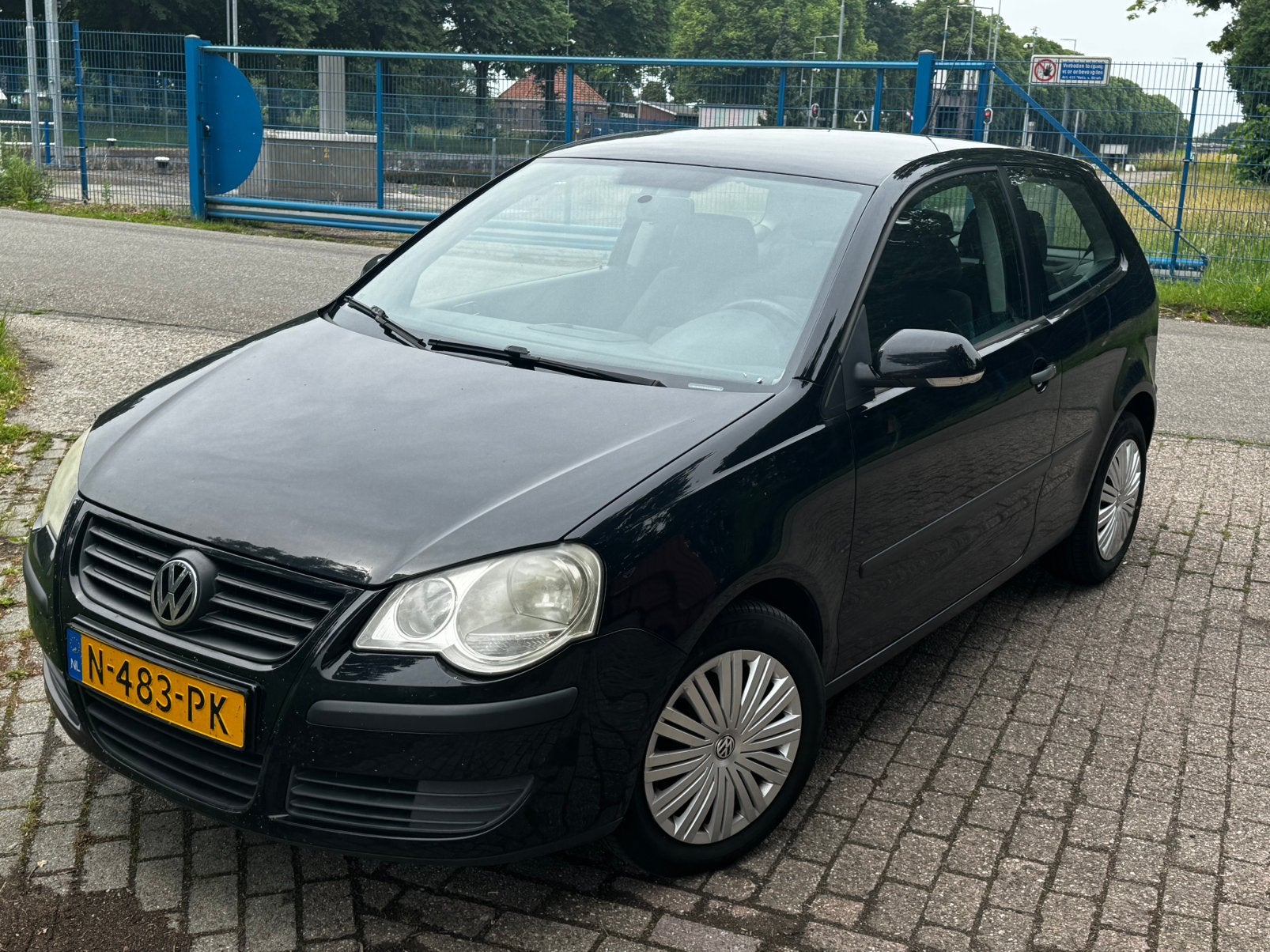 Volkswagen Polo 1.4 16V 59KW 2006 Zwart, Auto's, Volkswagen, Voorwielaandrijving, 4 cilinders, Zwart, Handgeschakeld
