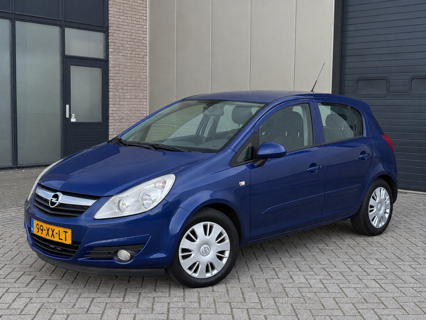 Opel Corsa 1.2-16V Business 5-DRS CarPlay Airco Navigatie, Voorwielaandrijving, Gebruikt, 4 cilinders, Blauw