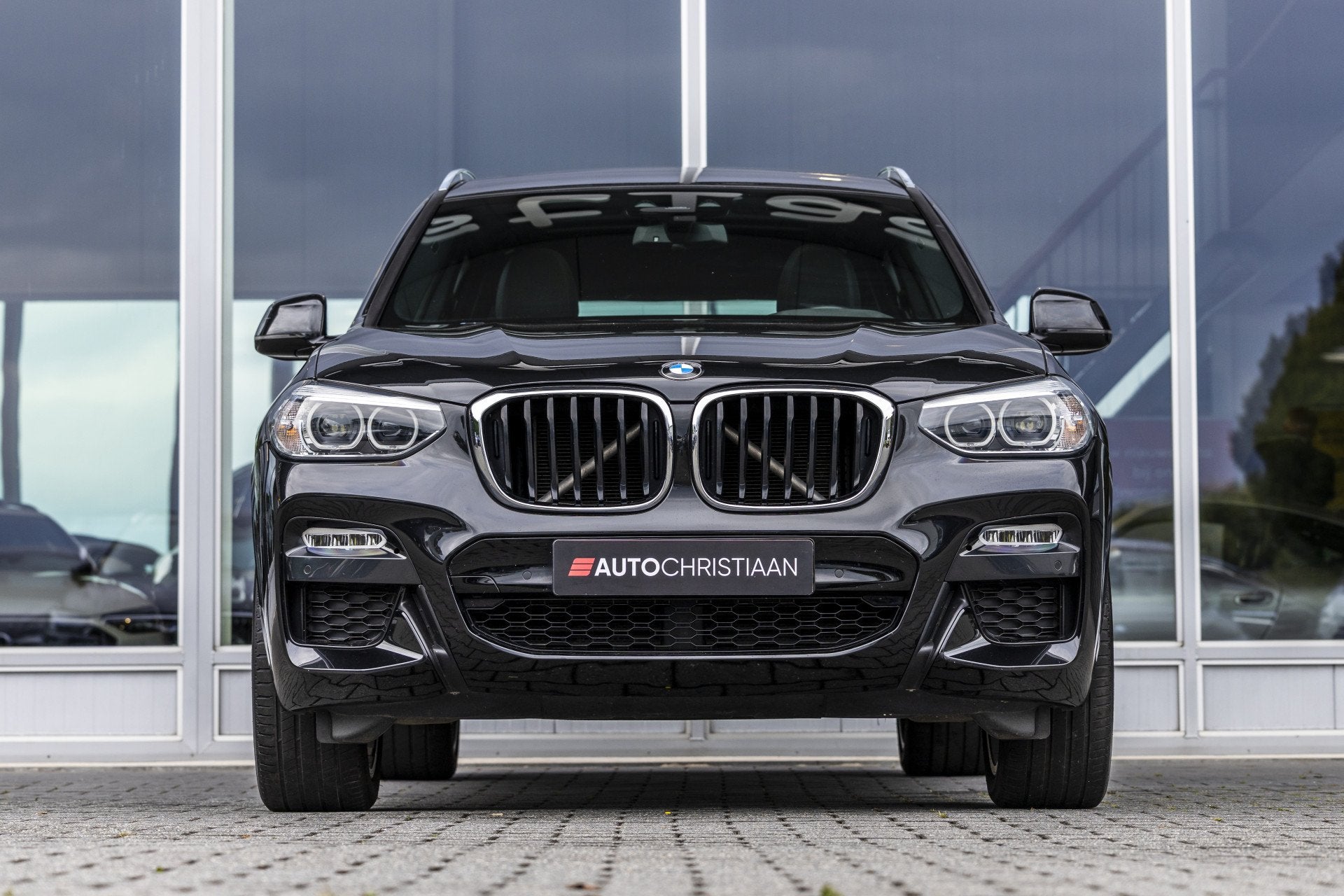 BMW X3 xDrive20i High Executive | Pano | Trekhaak | Head-up, Auto's, Gebruikt, 4 cilinders, Zwart, Bedrijf