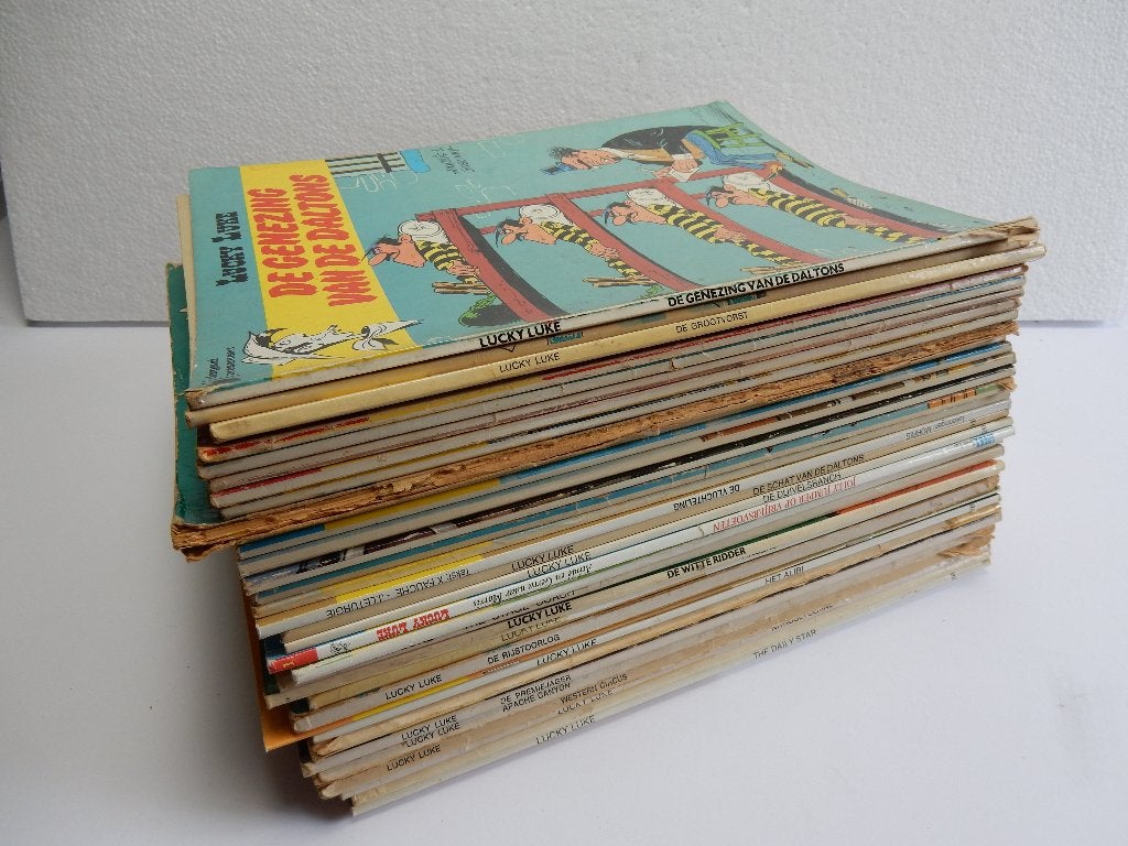Lucky Luke Stripverhaal, Gelezen, Ophalen of Verzenden, Morris, Meerdere stripboeken
