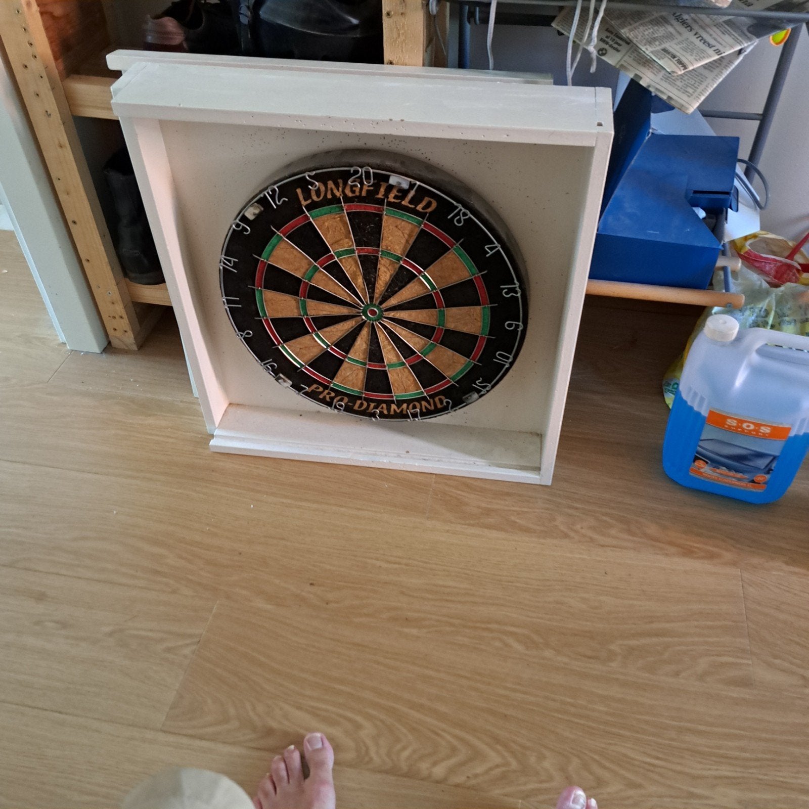 dart kast, Ophalen, Dartbord