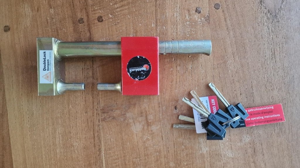Een DoubleLock Compact disselslot, compleet met 5 sleutels., Ophalen of Verzenden, Zo goed als nieuw