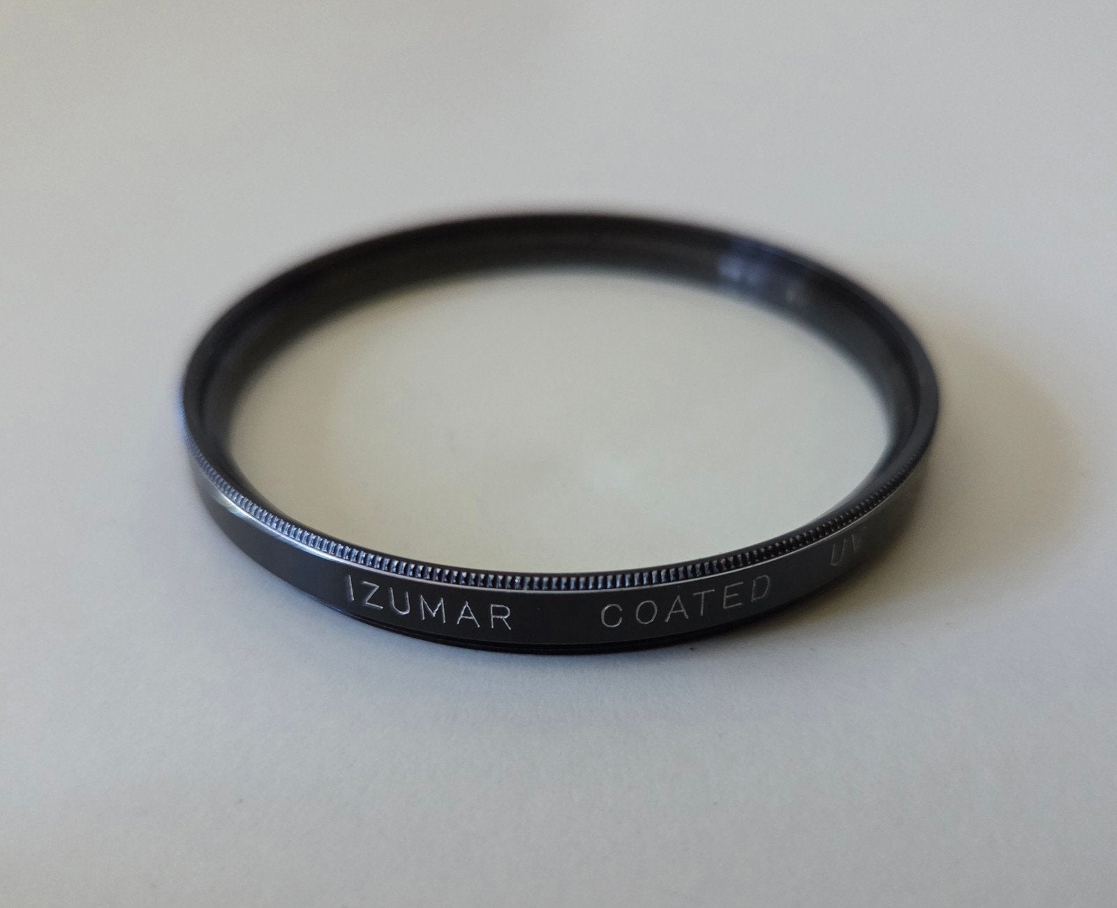Vintage Izumar coated cameralensfilter, Overige merken, Gebruikt, Ophalen of Verzenden, 50 tot 60 mm