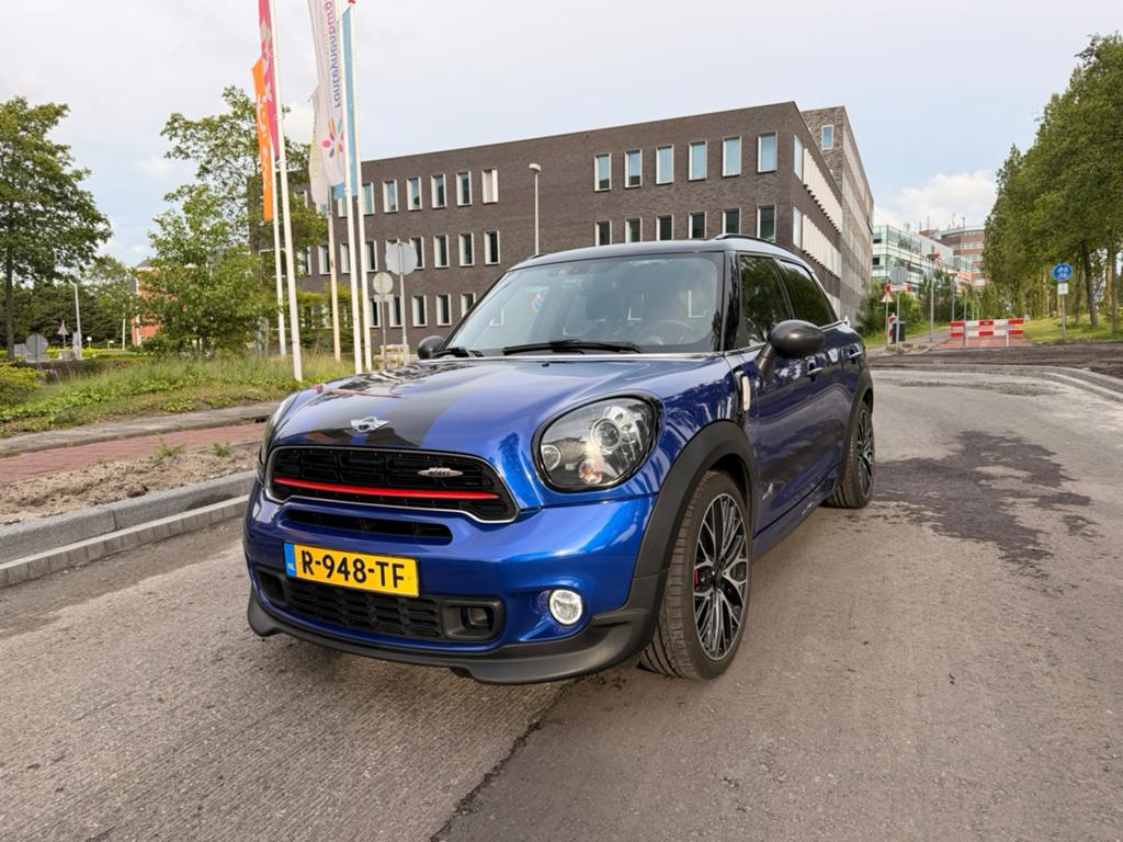Mini Countryman 1.6 John Cooper Works AUT 2015 Blauw, Auto's, Blauw, 75 €/maand, Vierwielaandrijving, Particulier