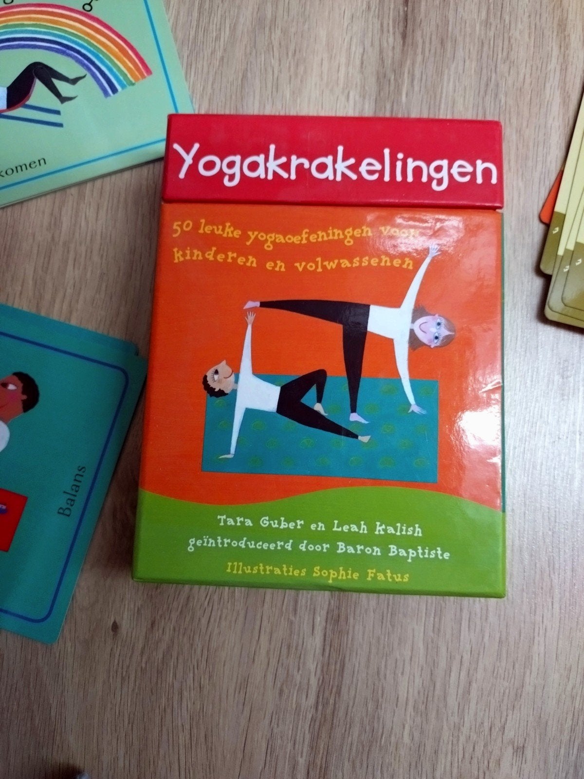 Yogakrakelingen: 50 leuke yogaoefeningen voor kids en vol, Ophalen of Verzenden, Zo goed als nieuw