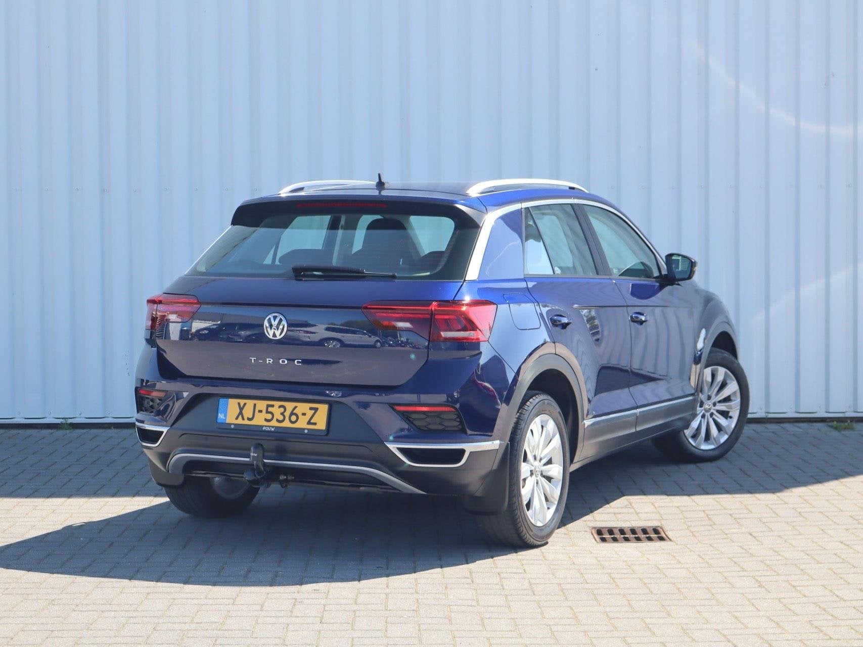 Volkswagen T-Roc 1.5 TSI 150pk DSG Sport | Trekhaak | Naviga, Auto's, Volkswagen, 12 maanden, Stof, 4 cilinders, Blauw