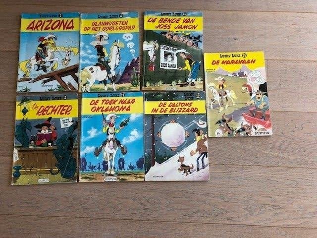 7 stripboeken Lucky Luke, Gelezen, Ophalen of Verzenden, Morris & Goscinny, Meerdere stripboeken