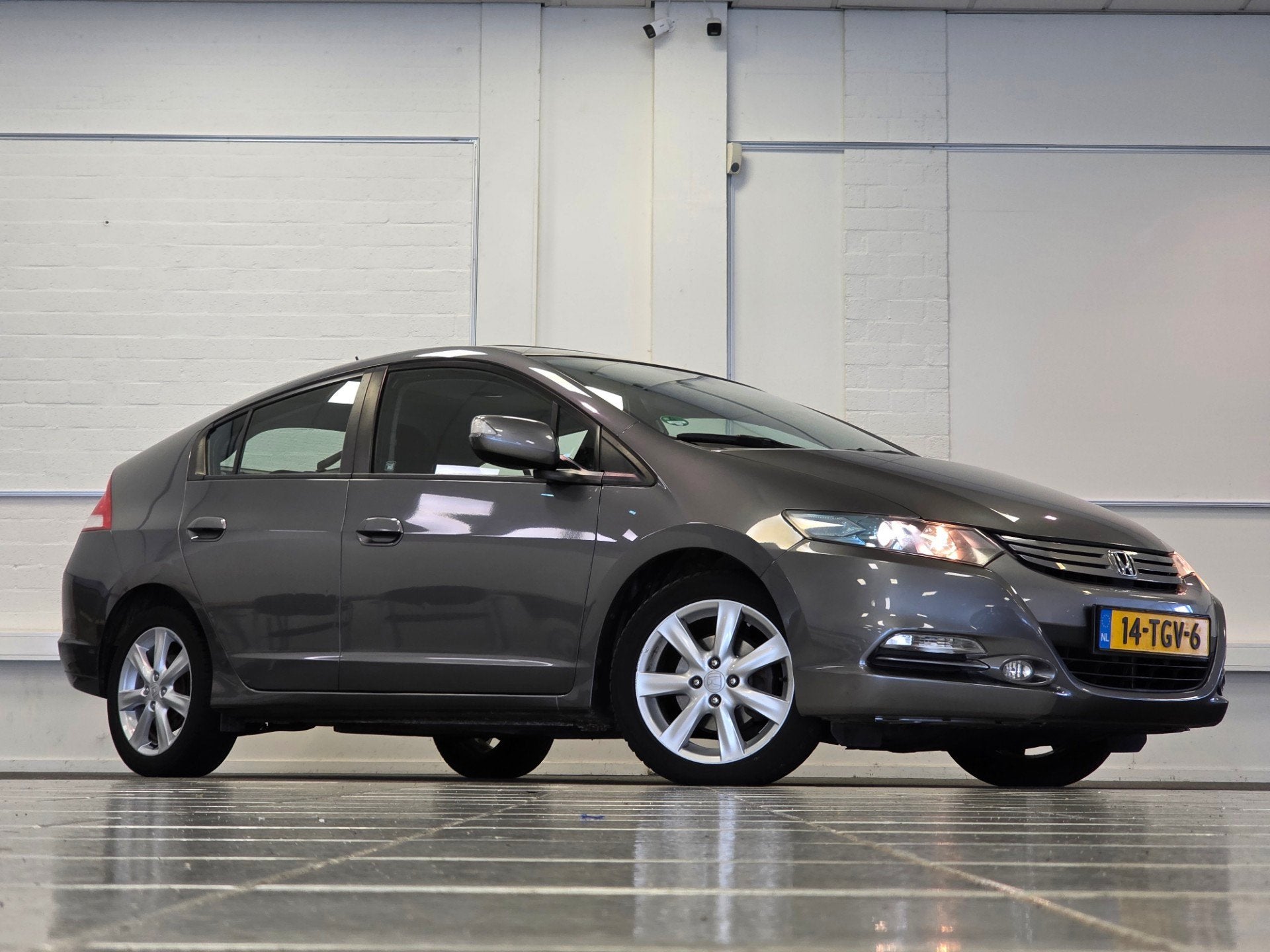 Honda Insight 1.3i Business Mode Schuif/kanteldak Navi PDC, Auto's, Euro 5, Stof, Gebruikt, Zwart