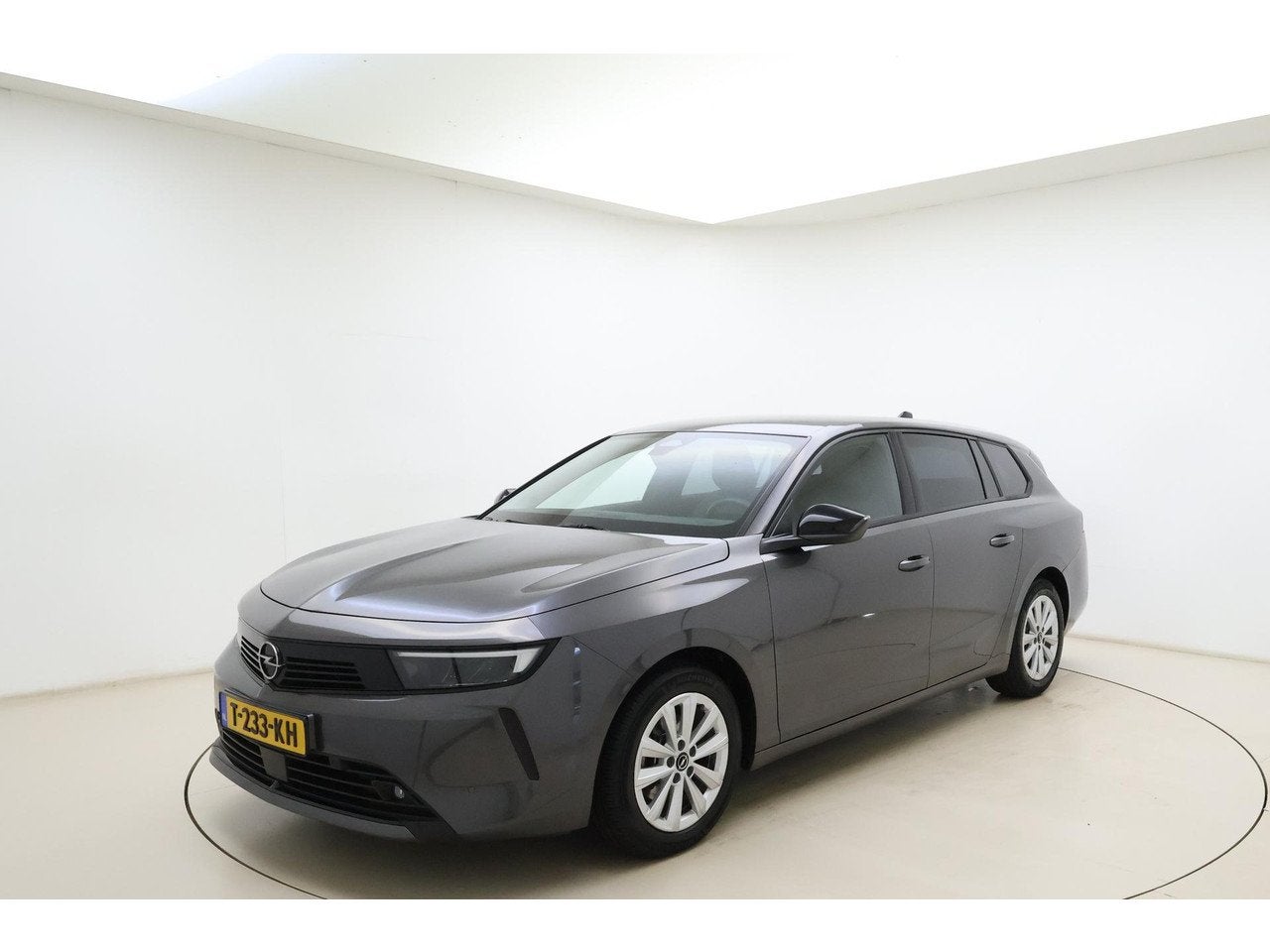 Opel Astra Sports Tourer 1.2 Turbo 110pk Edition | Navigatie, Auto's, Gebruikt, 1199 cc, Handgeschakeld, 19 km/l