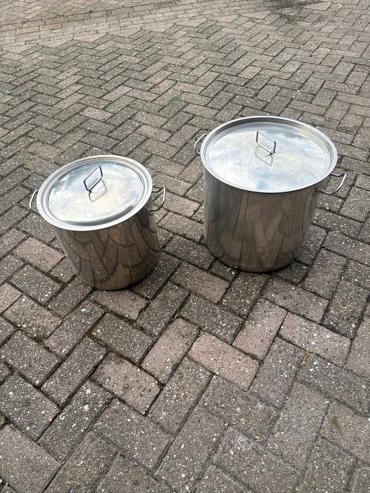 Grote RVS pannen met deksel - 2 stuks, Ophalen, Gebruikt