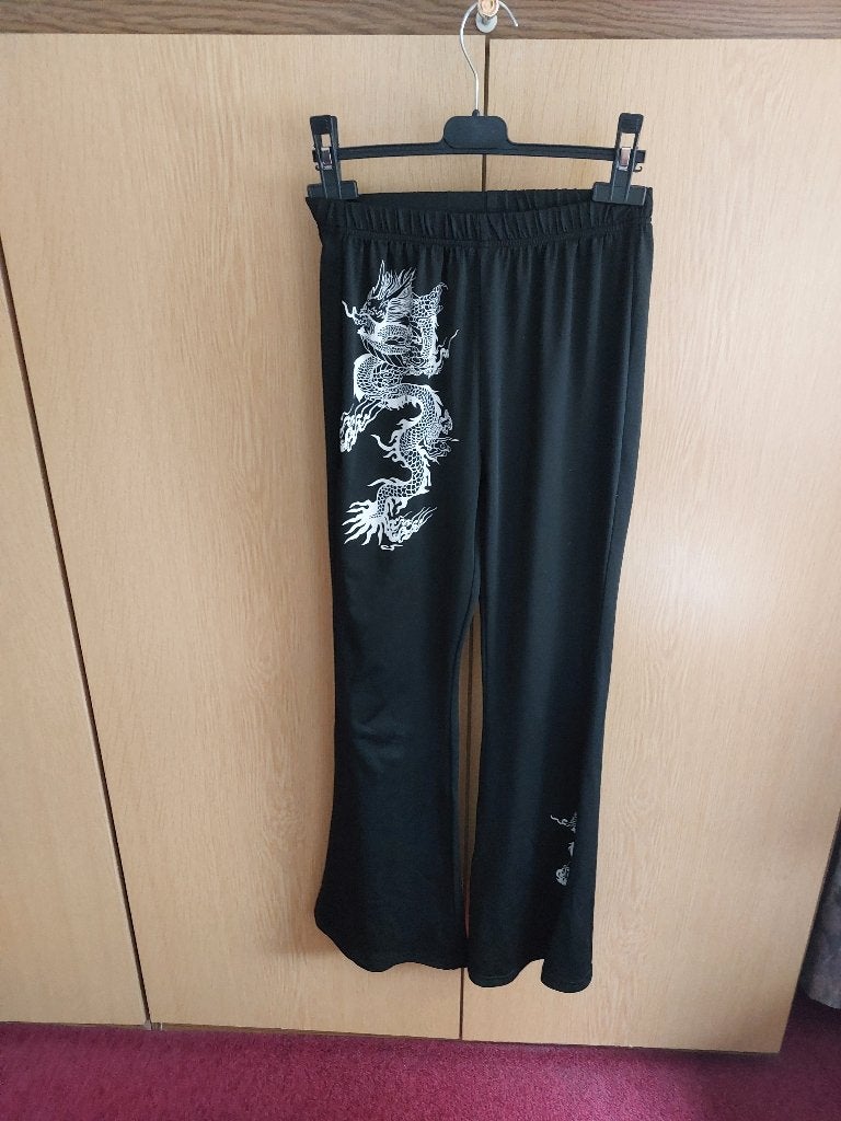 zwarte legging met wijde pijpen, taille 31 cm, lengte 97 cm., Legging, Zwart, Overige maten, Ophalen of Verzenden
