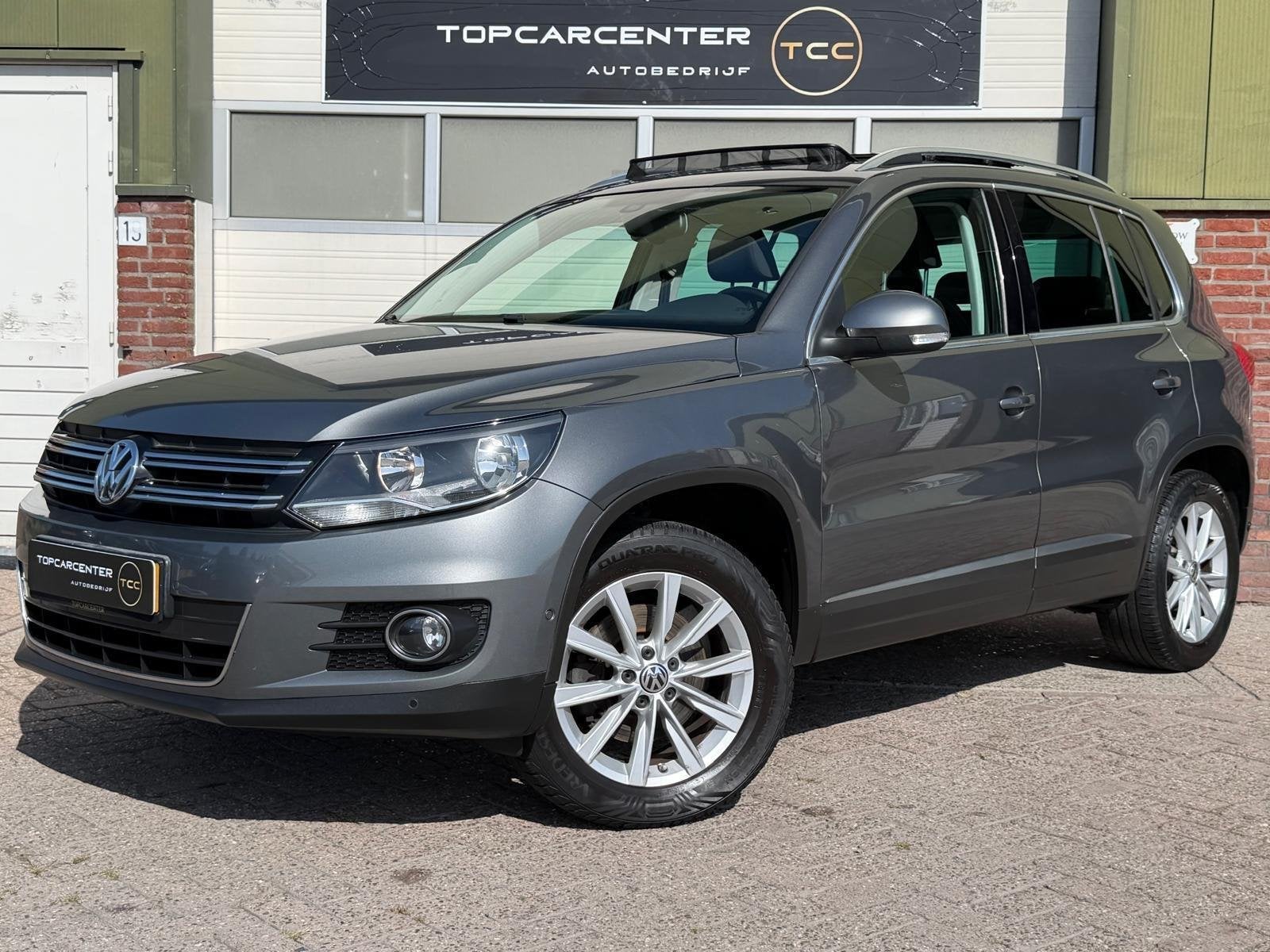 Volkswagen Tiguan 2.0 TSI Sport 4Motion/PANO/NAVI/PARKS/APK, Auto's, Euro 5, Gebruikt, 4 cilinders, Bedrijf