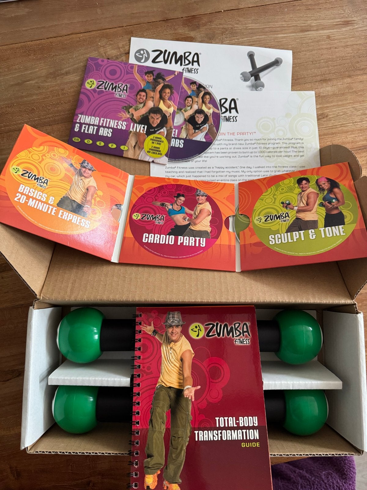 Zumba Fitness Total-Body Transformation Guide met DVD's, Verzenden, Nieuw, Armen, Dumbbell