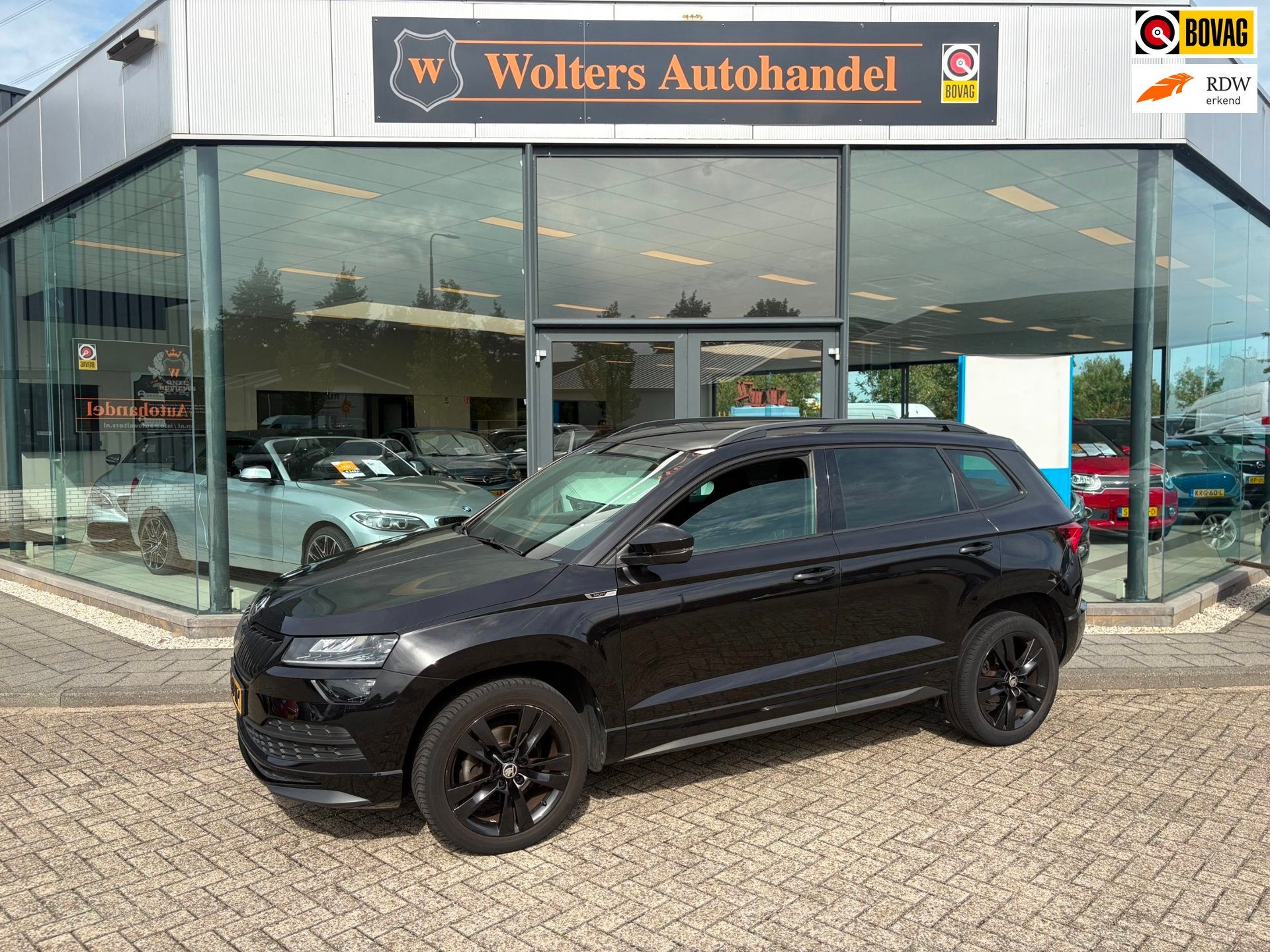 Skoda Karoq 1.5 TSI ACT Sportline Business, 4 cilinders, Zwart, Karoq, Bedrijf