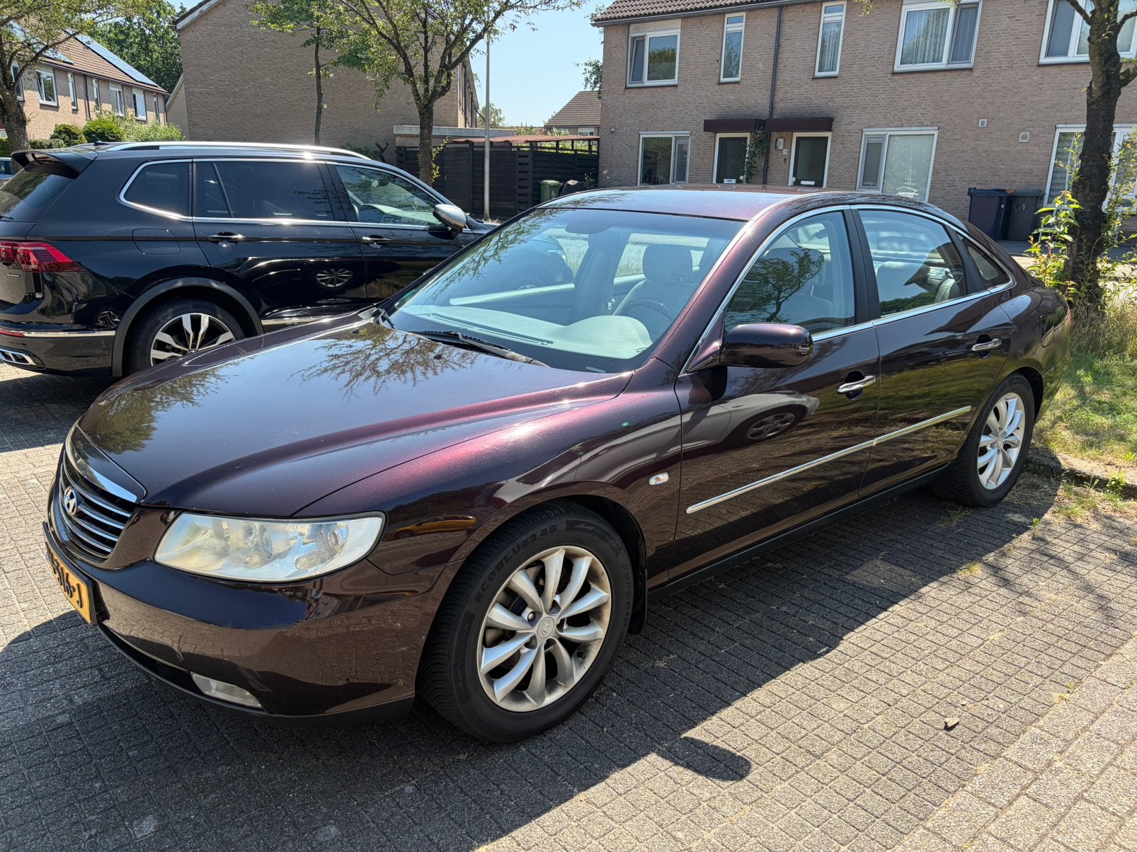 Hyundai 2005 Rood, Auto's, Hyundai, Particulier, Grandeur, ABS, Airbags, Airconditioning, Bluetooth, Boordcomputer, Centrale vergrendeling