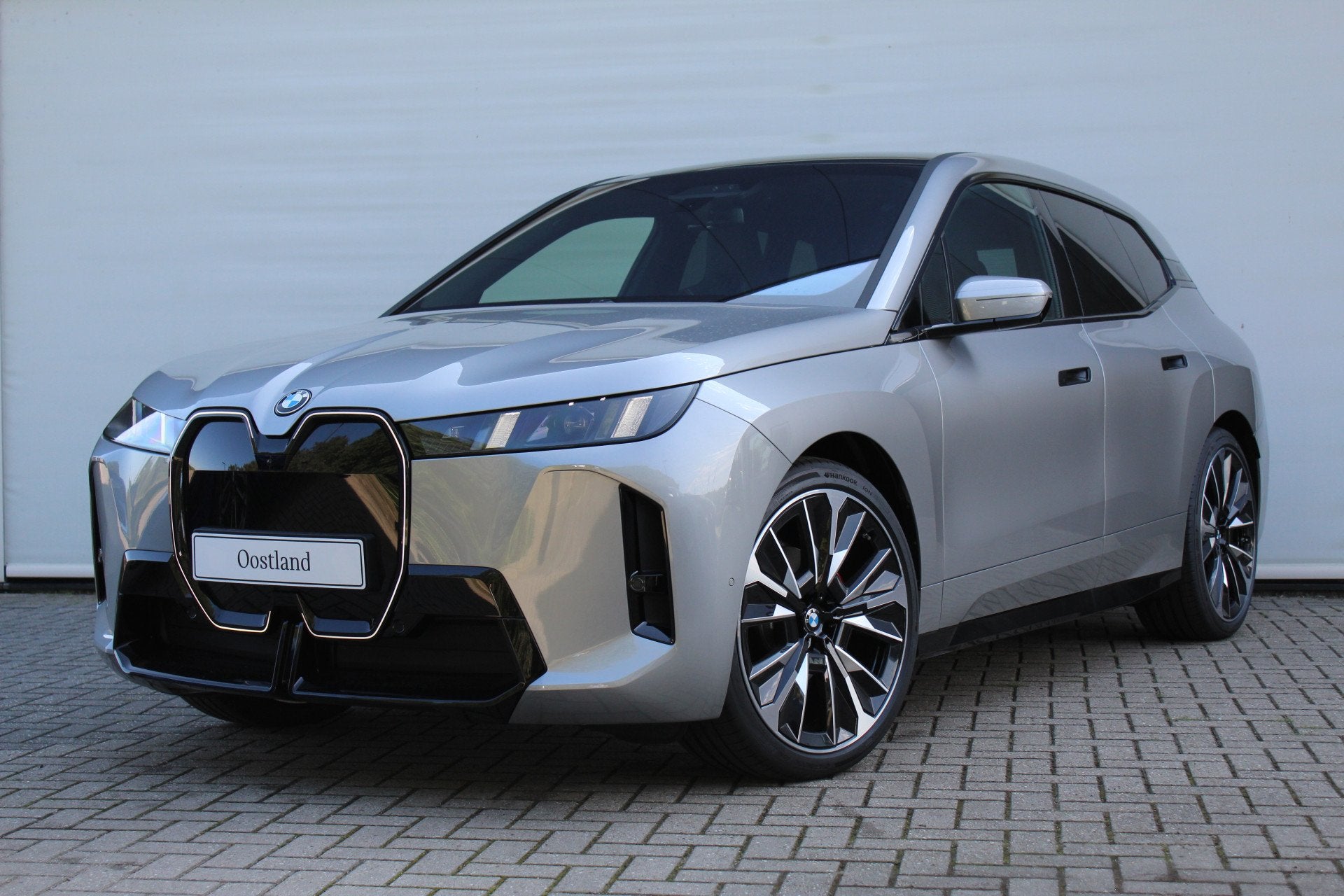 BMW iX xDrive45 M Sport / Trekhaak / Panoramadak Sky Lounge, Auto's, Automaat, Dealer onderhouden, Zwart, IX