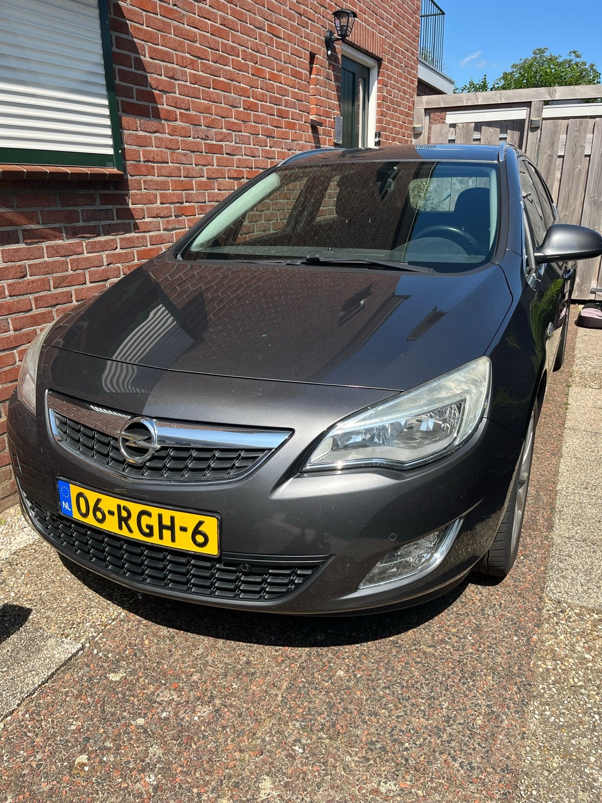 Opel Astra 1.4 Turbo 88KW Sports Tourer 2011 Grijs, Auto's, Voorwielaandrijving, Stof, Zwart, 4 cilinders