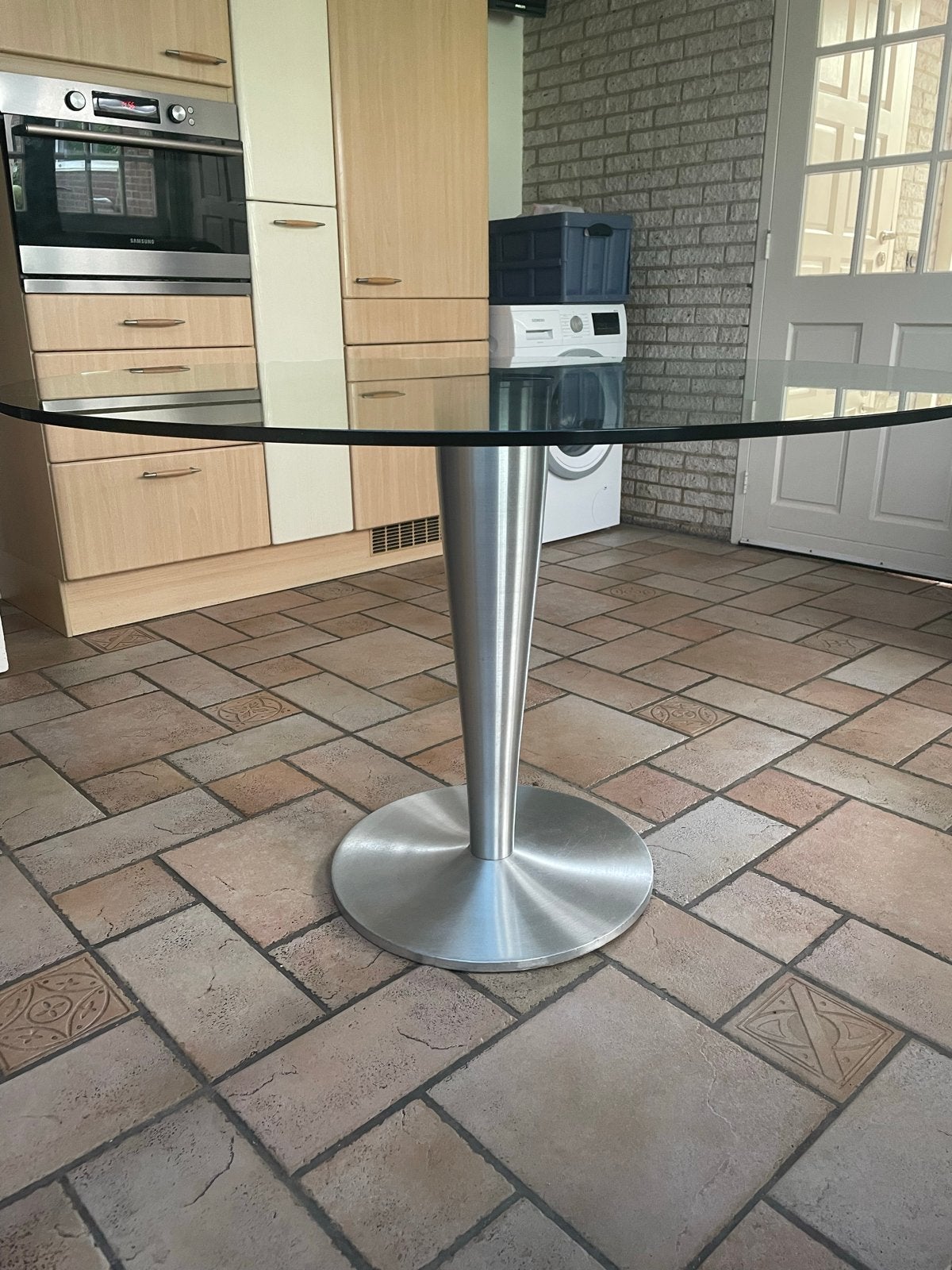 Glazen eettafel met metalen poot, Ophalen, Gebruikt, 100 tot 150 cm, Rond