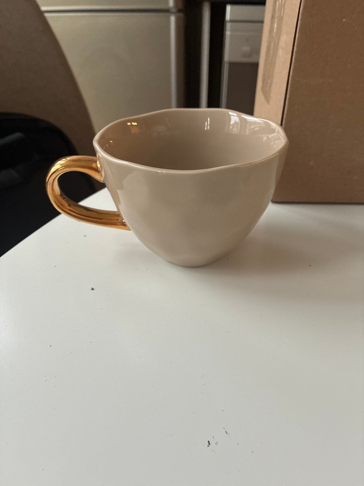 Mok Urban Nature Culture Amsterdam, beige met gouden oor, Overige merken, Keramiek, Zo goed als nieuw, Modern