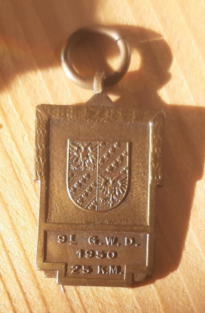 Medaille 9e G.W.D. 1950 25 K.M., Ophalen of Verzenden, Brons, Buitenland