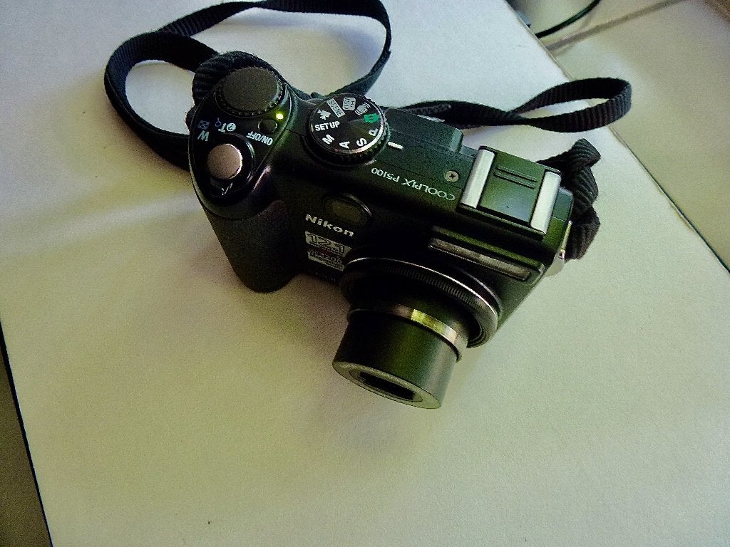 Nikon Coolpix P 5100, Audio, Tv en Foto, Gebruikt, Geheugenkaart, Ophalen of Verzenden, Compactcamera