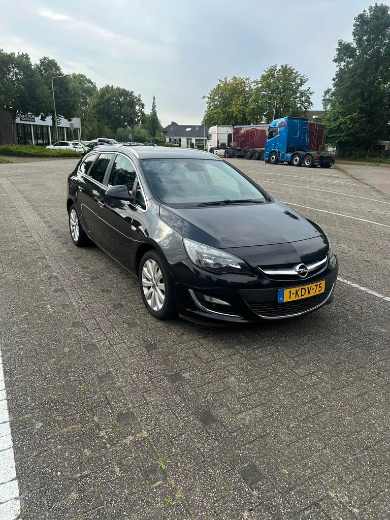 Opel Astra 1.4 Turbo 88KW Sports Tourer 2013 Zwart, Auto's, Opel, Voorwielaandrijving, 4 cilinders, Zwart, Origineel Nederlands
