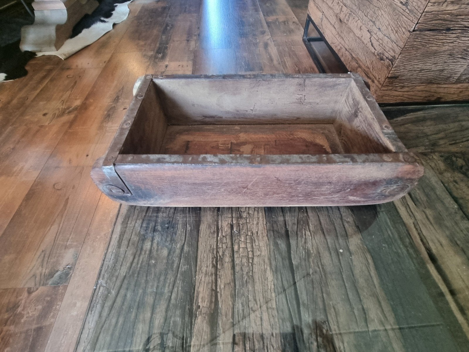 Te koop houten steenmal, Ophalen