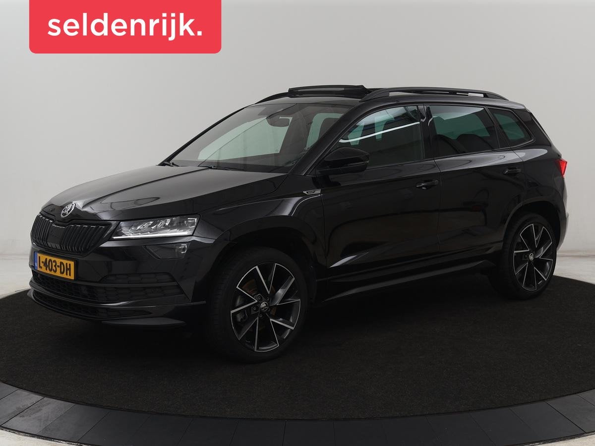 Skoda Karoq 1.5 TSI Sportline | Panoramadak | Stoelverwarmin, Auto's, Stof, 4 cilinders, 150 pk, Zwart