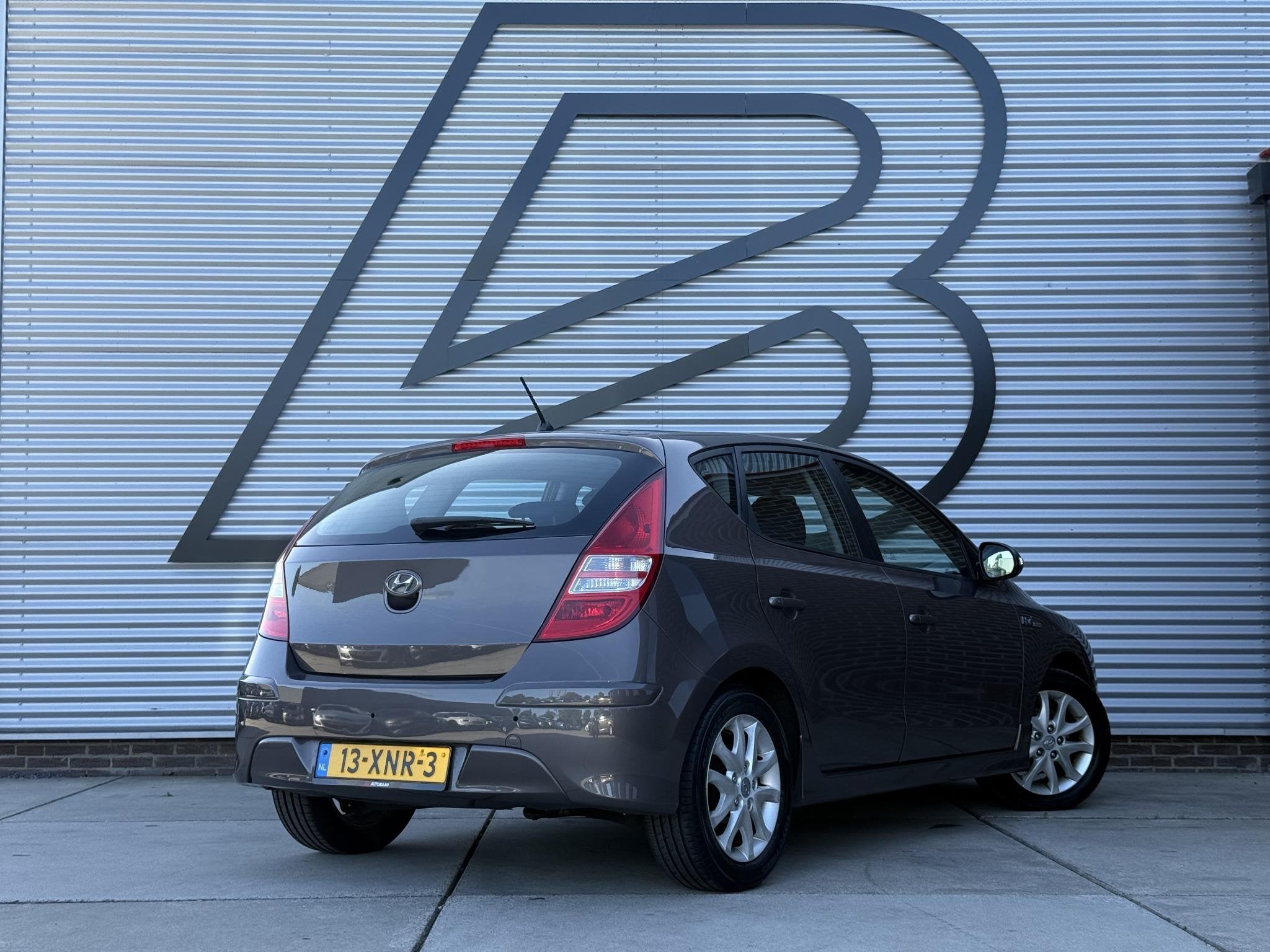 Hyundai i30 1.4i i-Motion 2e Eigenaar|Clima|Cruise|PDC|N.A.P, Auto's, Voorwielaandrijving, Euro 5, Stof, Gebruikt