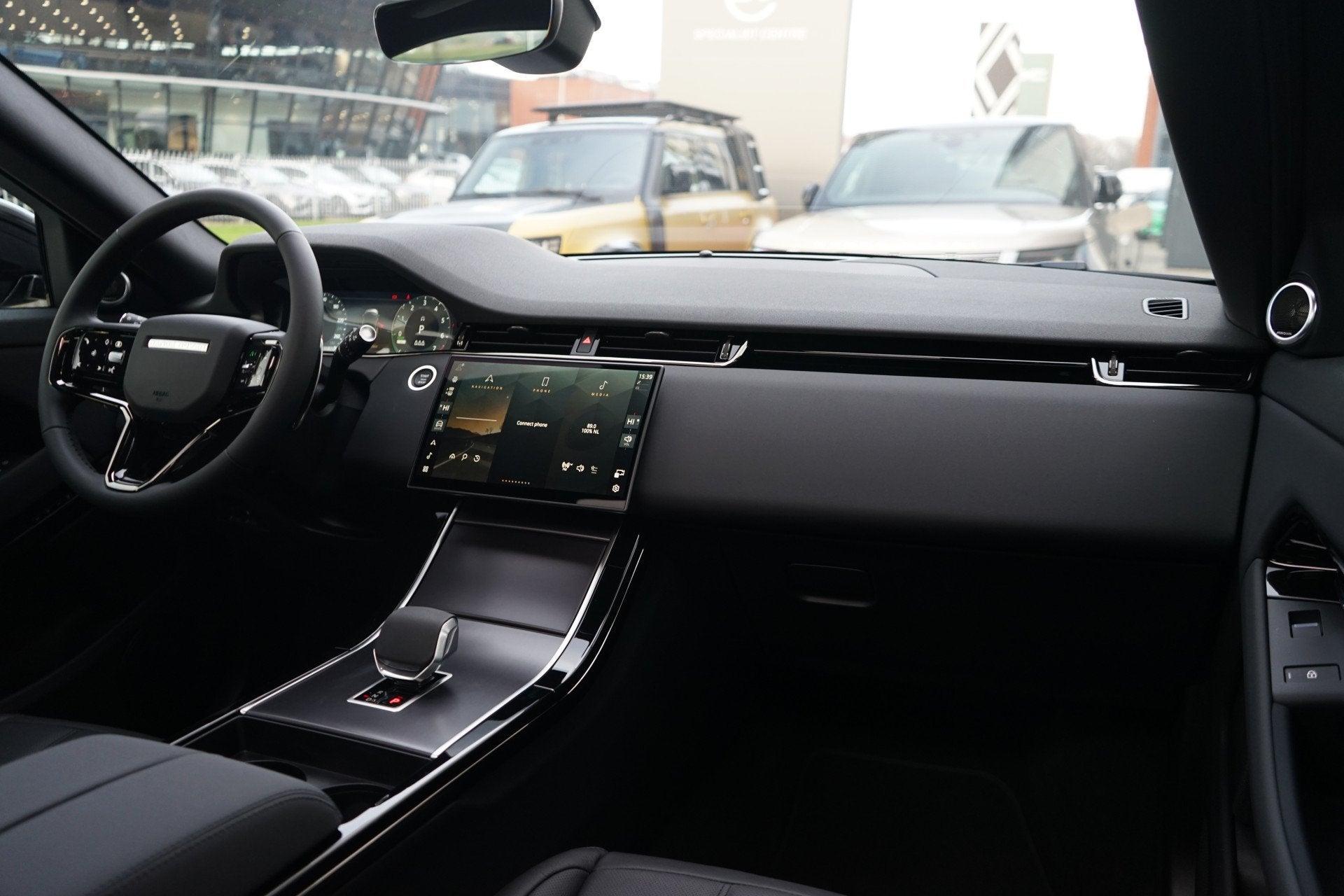 Land Rover Range Rover Evoque P270e PHEV AWD Business Dynami, Auto's, Zwart, Bedrijf, Hybride Elektrisch/Benzine, SUV of Terreinwagen