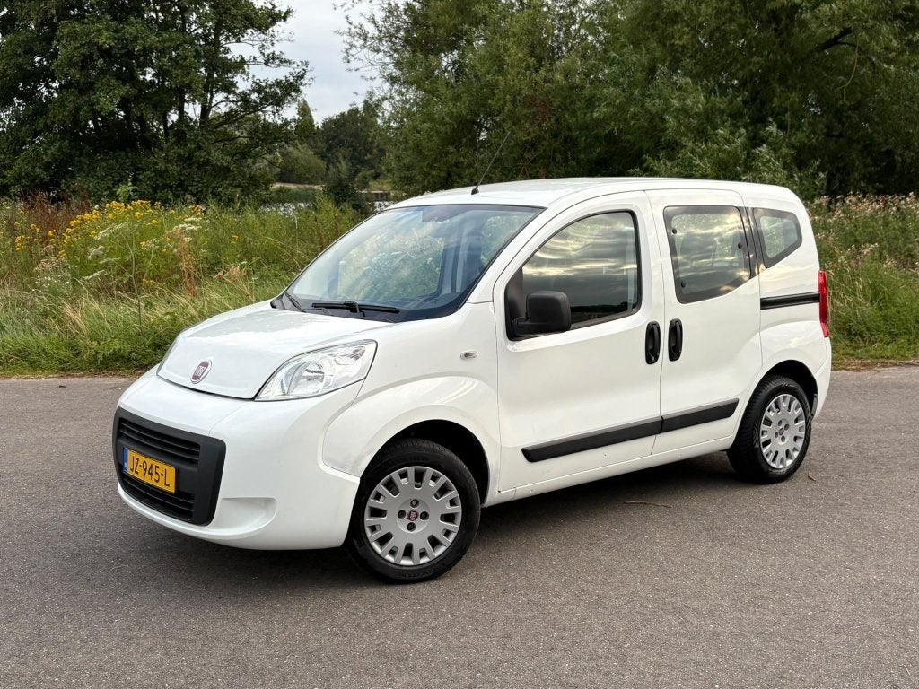 Fiat Qubo 1.4 Easy Trekhaak Airco Cruise Control APK, Auto's, 4 cilinders, 400 kg, Leder en Stof, Wit