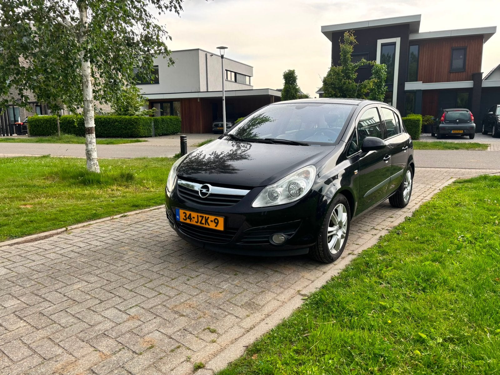 Opel Corsa 1.4 16V 5D 2009 Zwart, Auto's, Voorwielaandrijving, 1063 kg, 4 cilinders, Origineel Nederlands