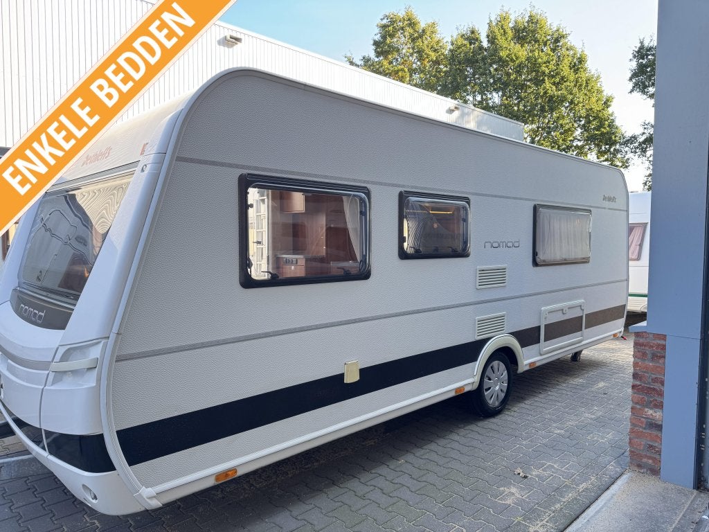 Dethleffs Nomad 560 RET / enkele bedden / nieuwe voortent, Rondzit, Dethleffs, 5 tot 6 meter, Tot en met 4