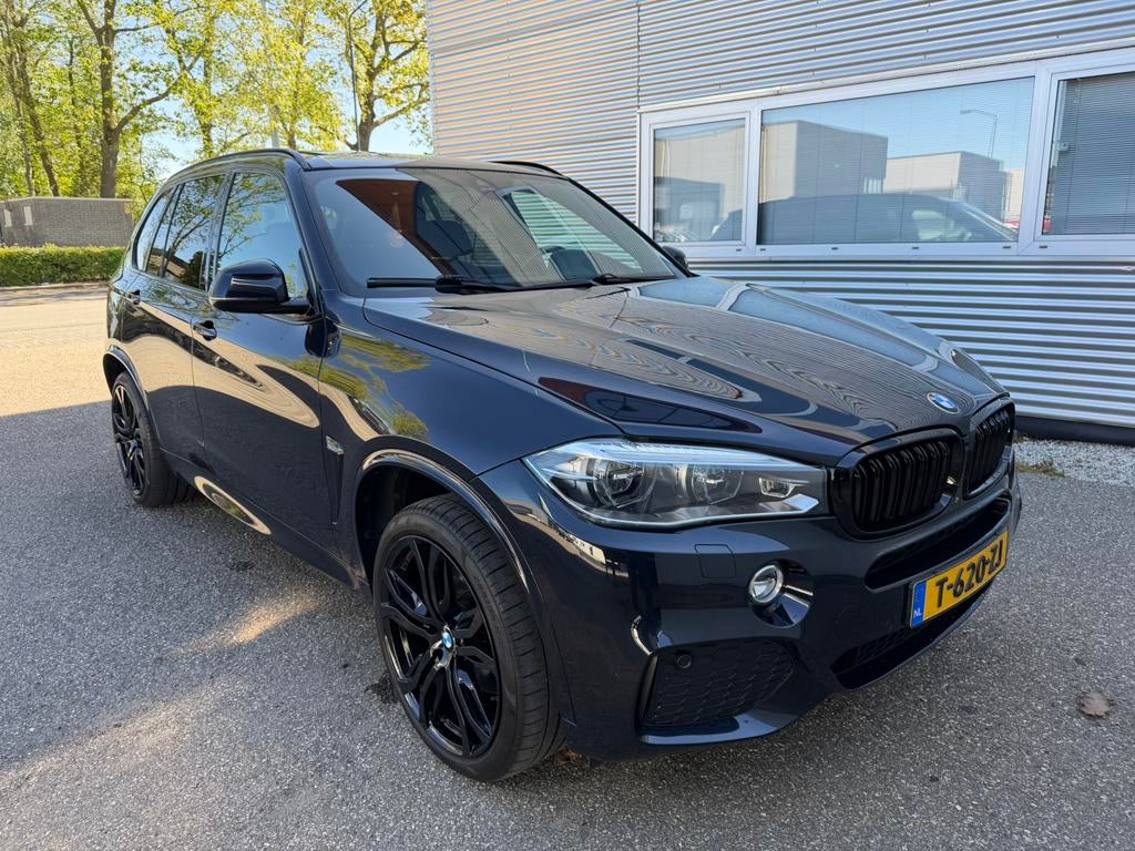 BMW X5 Xdrive40e Iperformance 313pk Aut 2017 Zwart, Auto's, X5, 4 cilinders, Zwart, Bruin