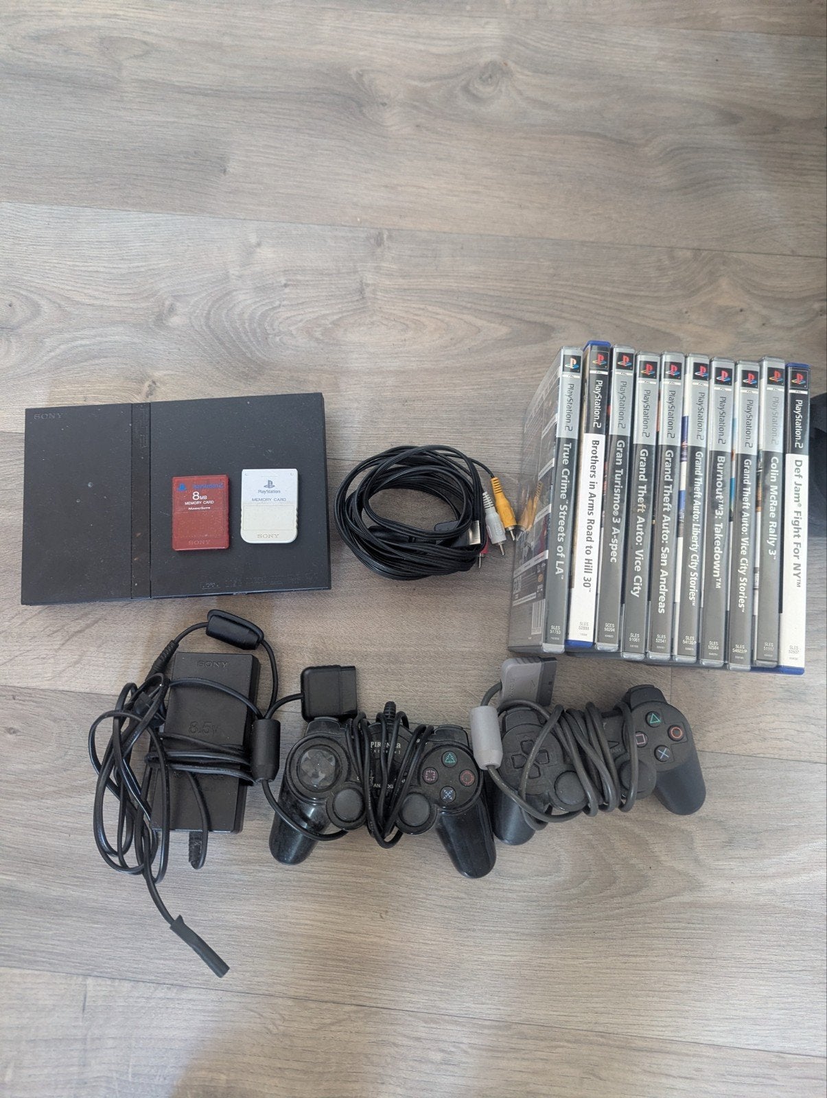PlayStation 2 Slim met 10 spellen en alle kabels, Spelcomputers en Games, Ophalen of Verzenden