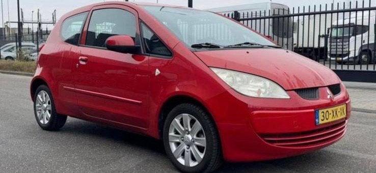 Mitsubishi Colt 1.3 Mivec CZ3 AUT 2004 Rood, Auto's, Stof, Colt, Origineel Nederlands, Euro 4