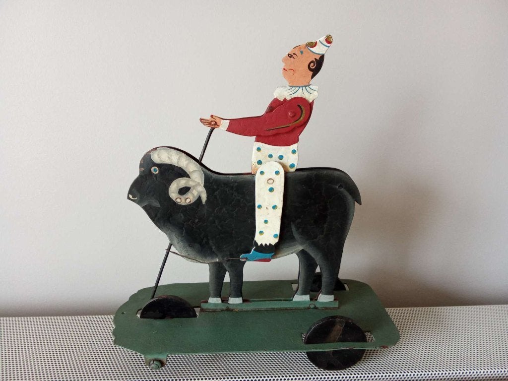 Antiek trekspeelgoed zwarte ram met clown, Antiek en Kunst, Ophalen of Verzenden