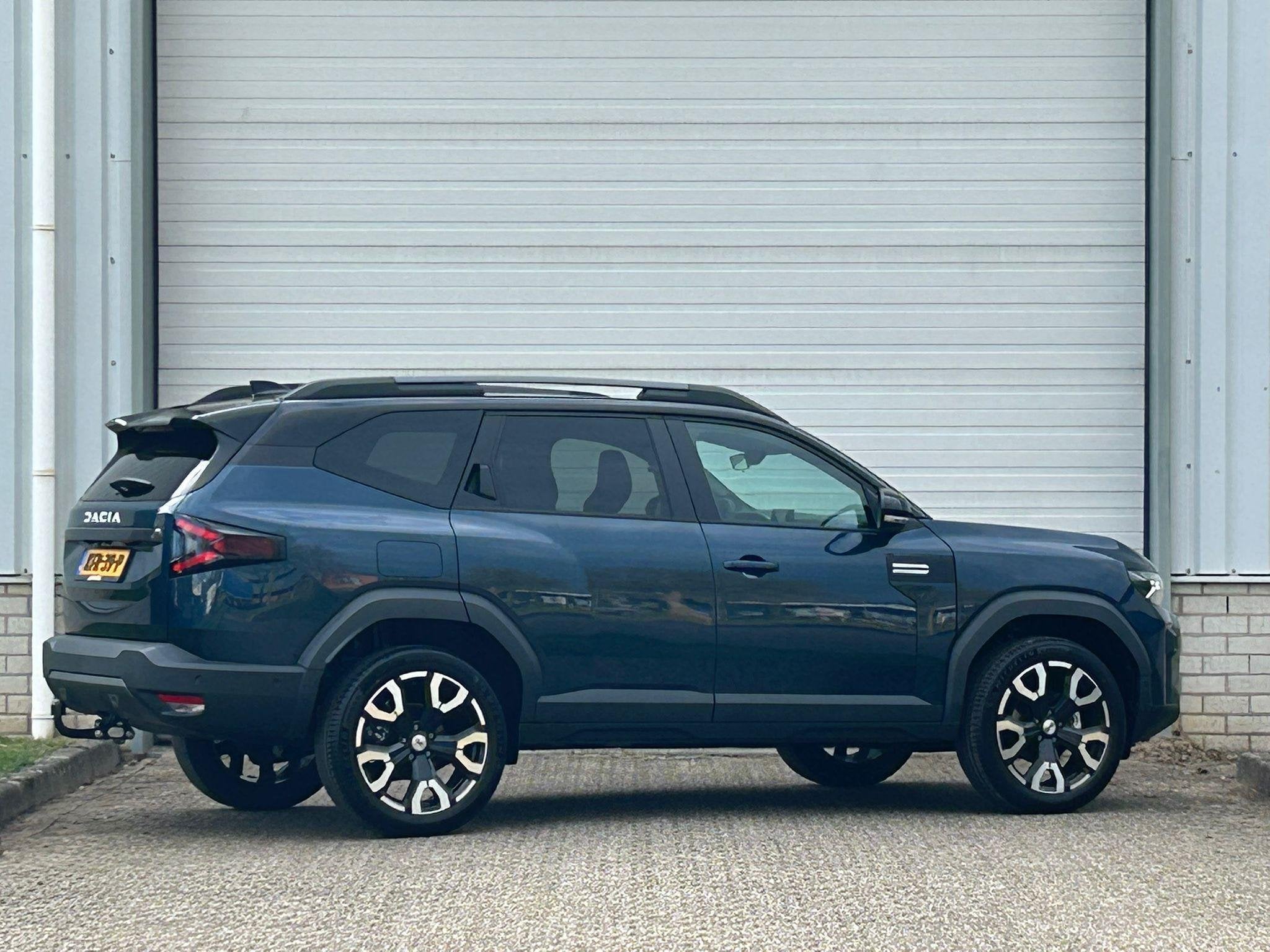 Dacia Bigster 1.8 Hybrid 155 Limited Edition / Trekhaak / El, Auto's, Dacia, Stof, Euro 6, 4 cilinders, Blauw